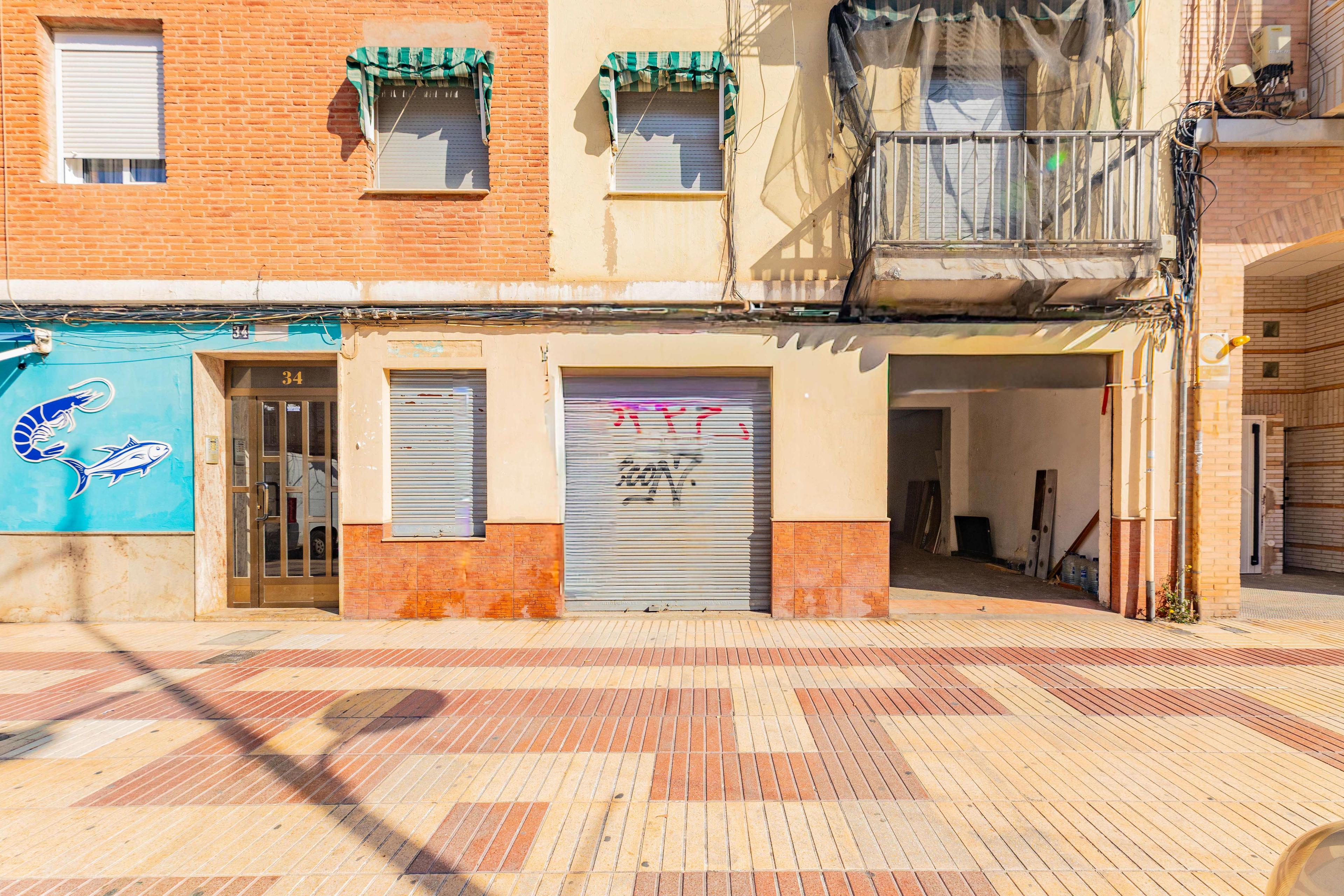 Oportunidad de Inversión: Bajo de 106 m² en la Arteria Comercial de Meliana - 25